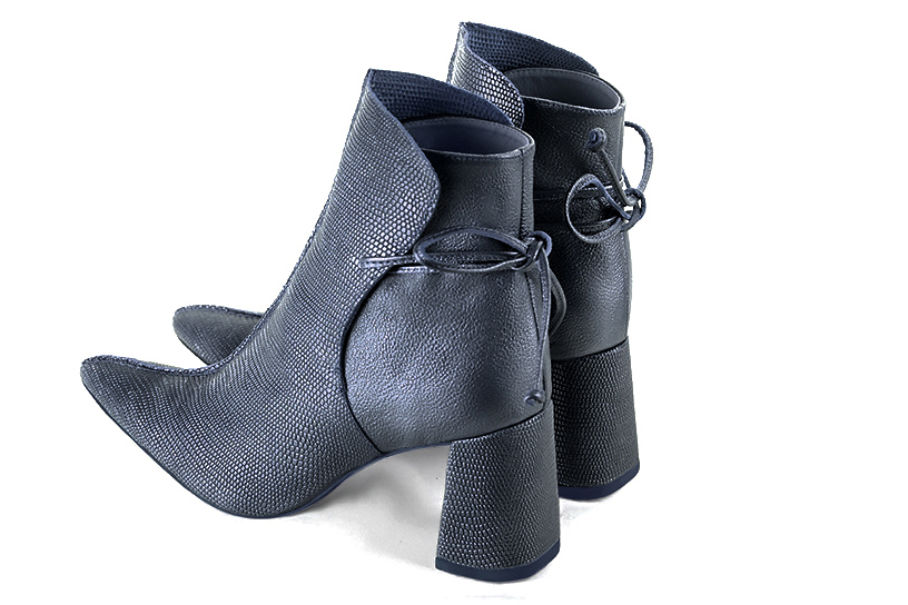 Denim blue women's ankle boots with laces at the back. Tapered toe. High flare heels. Rear view - Florence KOOIJMAN